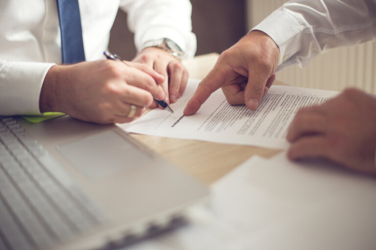 business owner signing licensing agreement