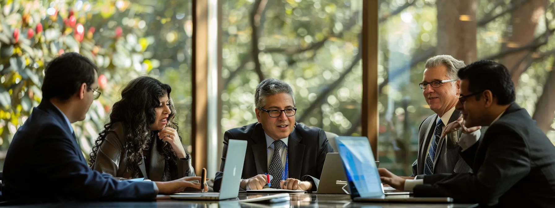 a group of lawyers and investors discussing legal precedents and strategies around a conference table with laptops and legal documents.